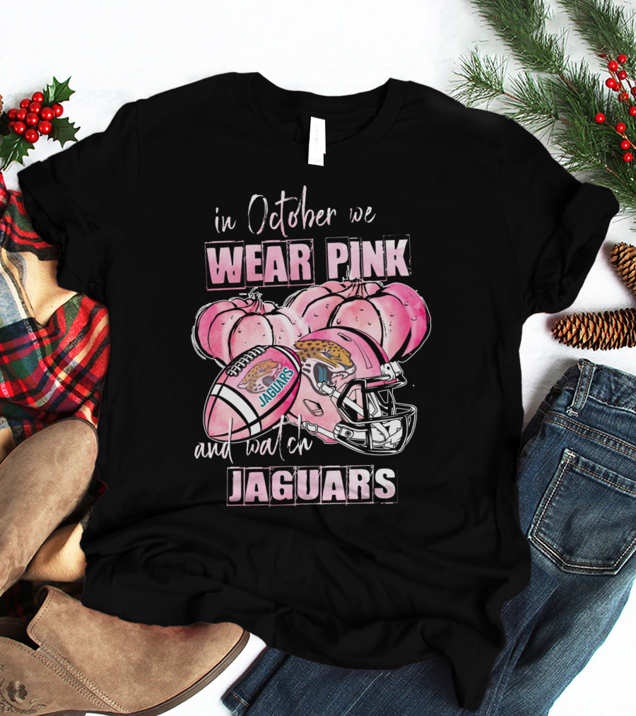 In October We Wear Pink And Watch Jaguars Football Helmet Pumpkins T-Shirt