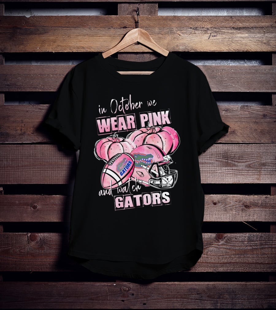 In October We Wear Pink And Watch Florida Gators Football Helmet Pumpkins T-Shirt