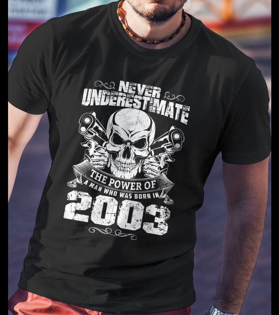 NEVER UNDERESTIMATE THE POWER OF A MAN WHO WAS BORN IN 2003 SKULL AND PISTOLS T-Shirt