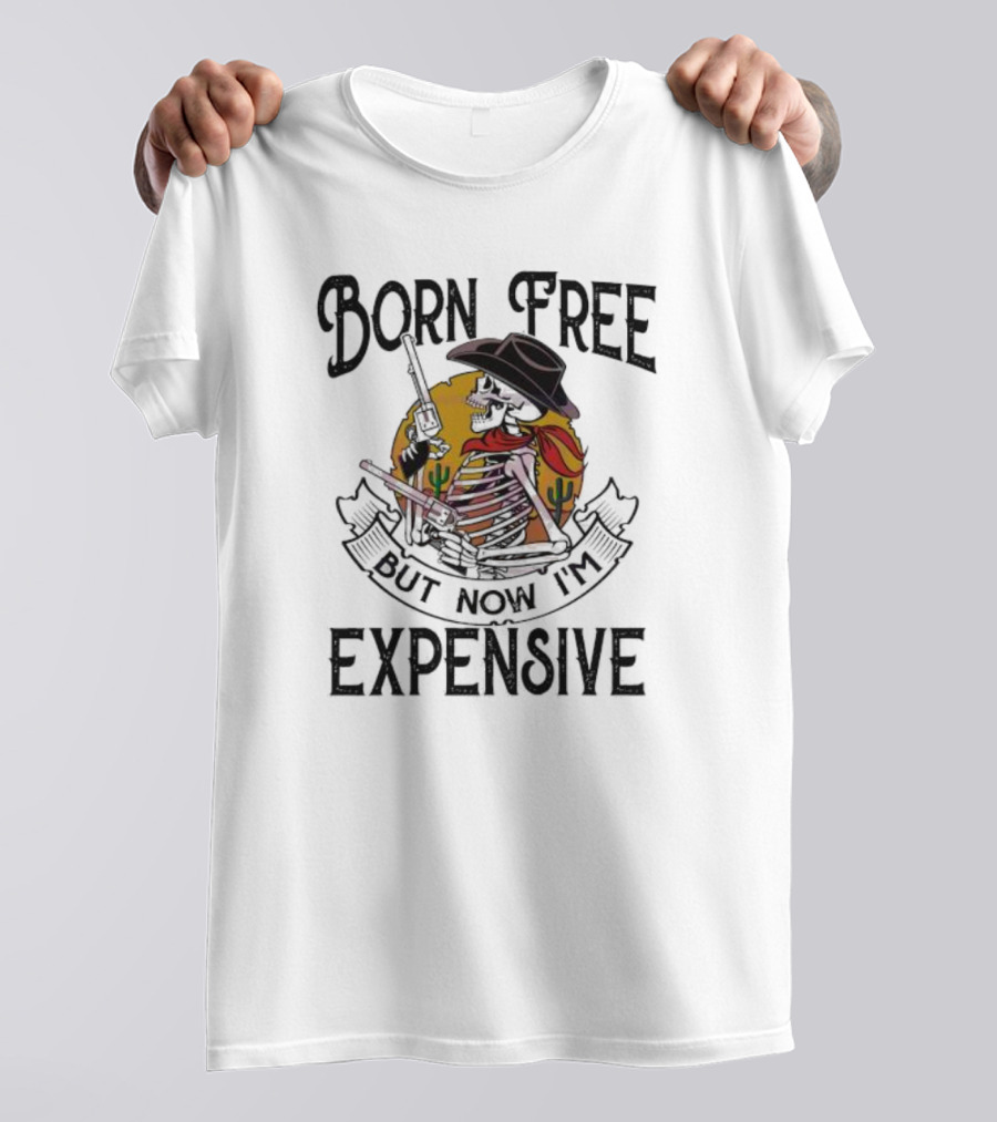 Skeleton Cowboy Born Free But Now I'm Expensive With Gun And Cactus Background T-Shirt