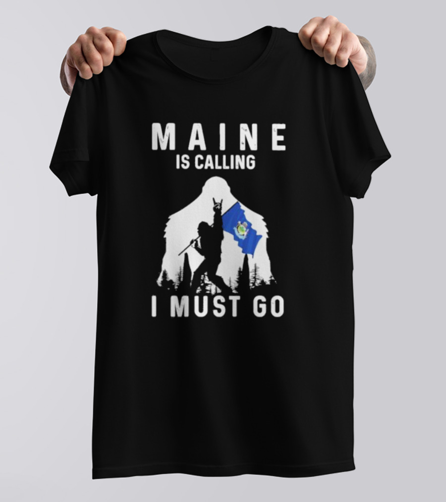 Maine Is Calling I Must Go Bigfoot Holding Maine Flag T-Shirt