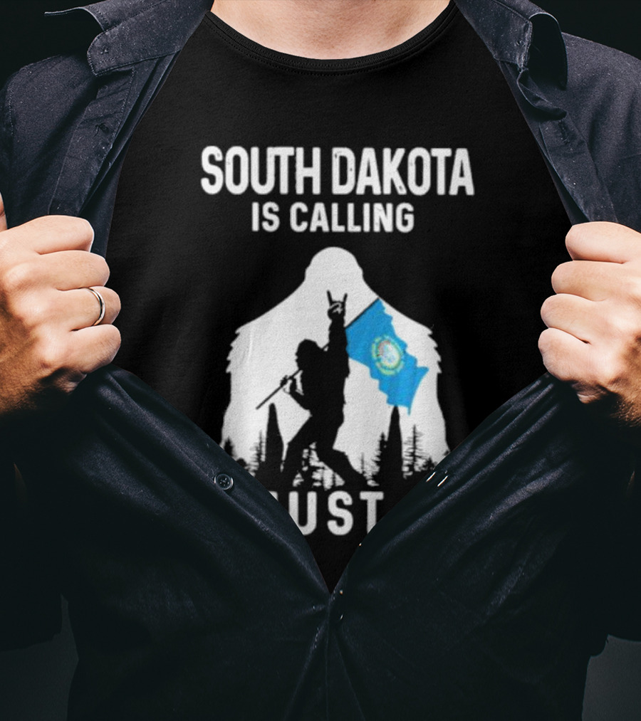South Dakota Is Calling I Must Go Bigfoot Holding South Dakota Flag T-Shirt