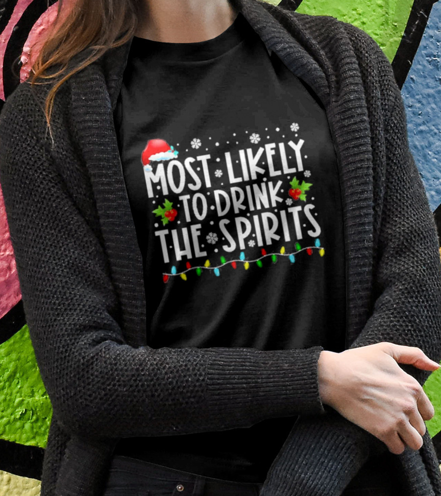 Most Likely To Drink The Spirits Santa Hat Christmas Lights Snowflakes Holly T-Shirt