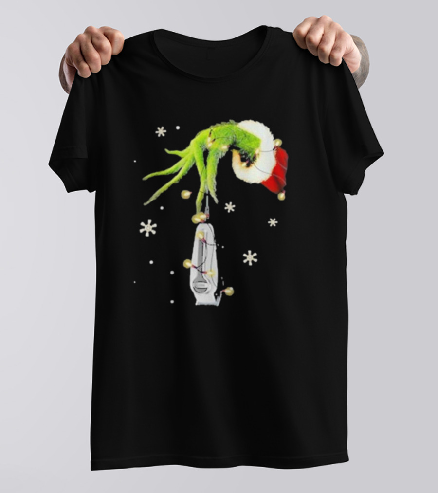Grinch Christmas Hand Holding Clipper Snowflakes Santa Hat T-Shirt