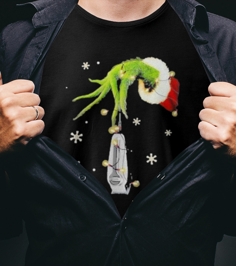 Grinch Christmas Hand Holding Clipper Snowflakes Santa Hat T-Shirt