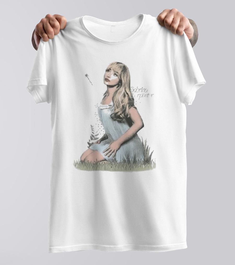Sabrina Carpenter Sitting In Grass With Sparkle Wand And Flowing Hair T-Shirt