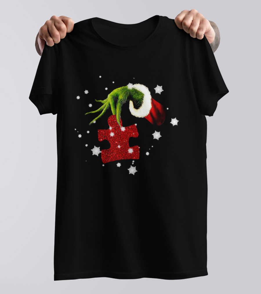 Grinch Hand Holding Red Glitter Puzzle Piece Autism Christmas Snowflakes T-Shirt