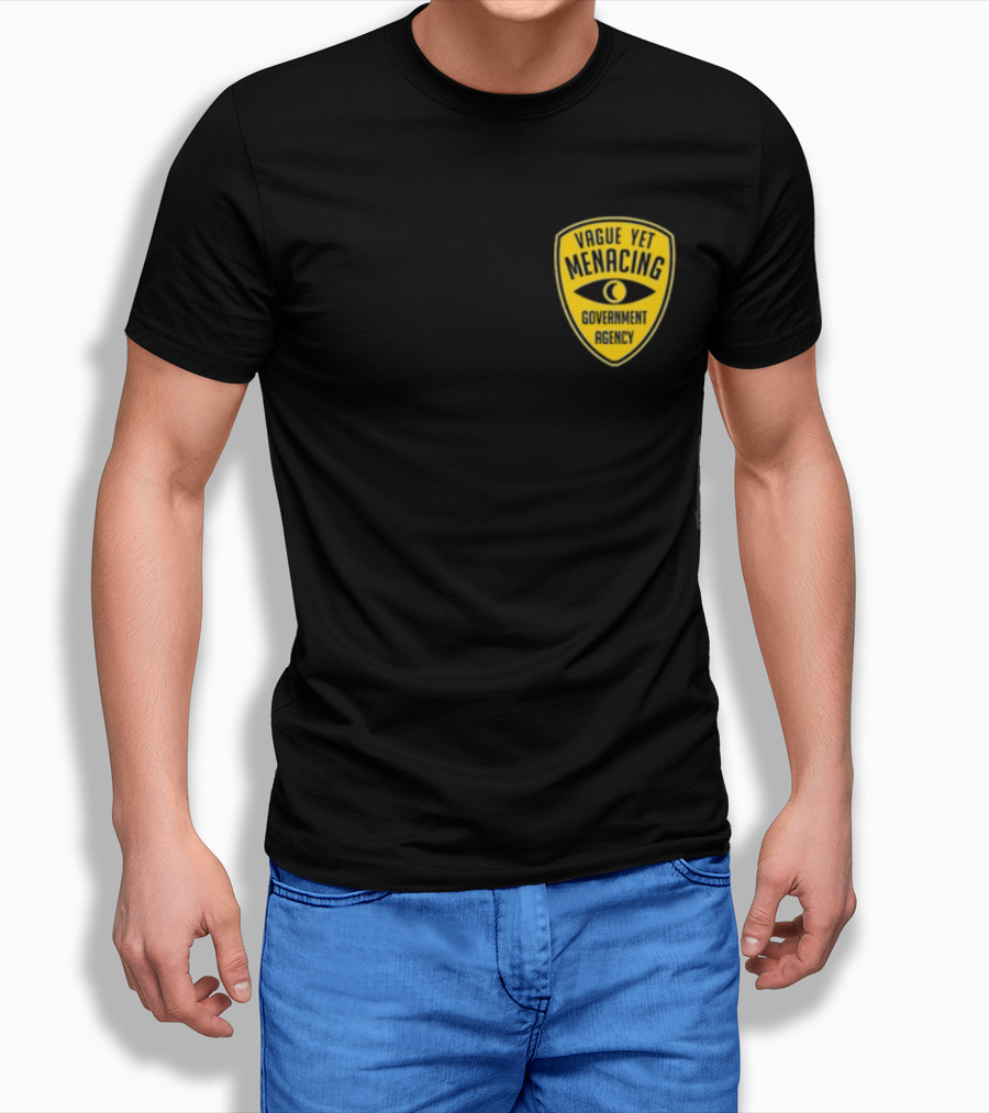 Vague Yet Menacing Government Agency Yellow Badge With Eye T-Shirt