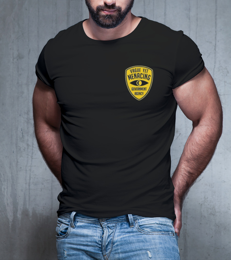 Vague Yet Menacing Government Agency Yellow Badge With Eye T-Shirt