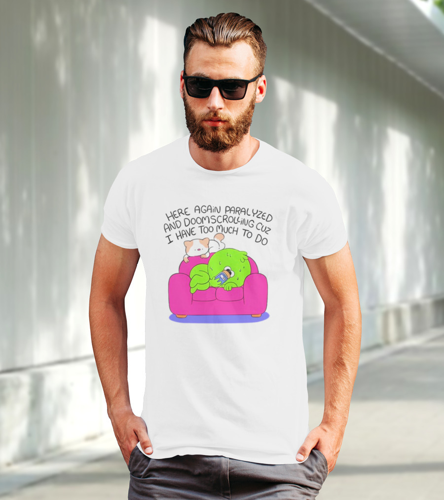Here Again Paralyzed And Doomscrolling Cuz I Have Too Much To Do Quirky Green Figure Relaxing On Pink Couch With Cute Dog T-Shirt