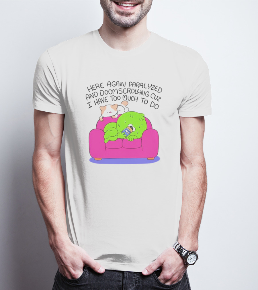 Here Again Paralyzed And Doomscrolling Cuz I Have Too Much To Do Quirky Green Figure Relaxing On Pink Couch With Cute Dog T-Shirt