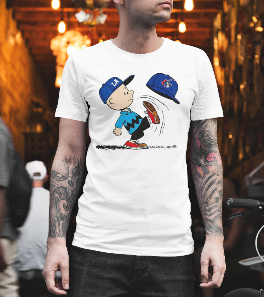 Los Angeles Dodgers LA Cap Charlie Brown Kicking Toronto Blue Jays Hat Peanuts Crossover T-Shirt