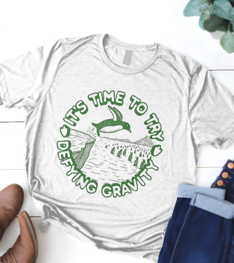 It's Time To Try Defying Gravity Penguin Jumping Scene T-Shirt