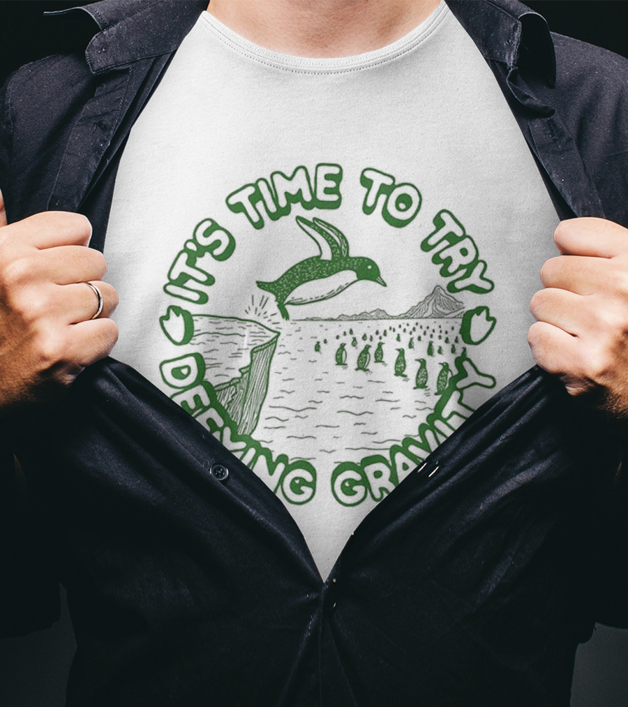 It's Time To Try Defying Gravity Penguin Jumping Scene T-Shirt