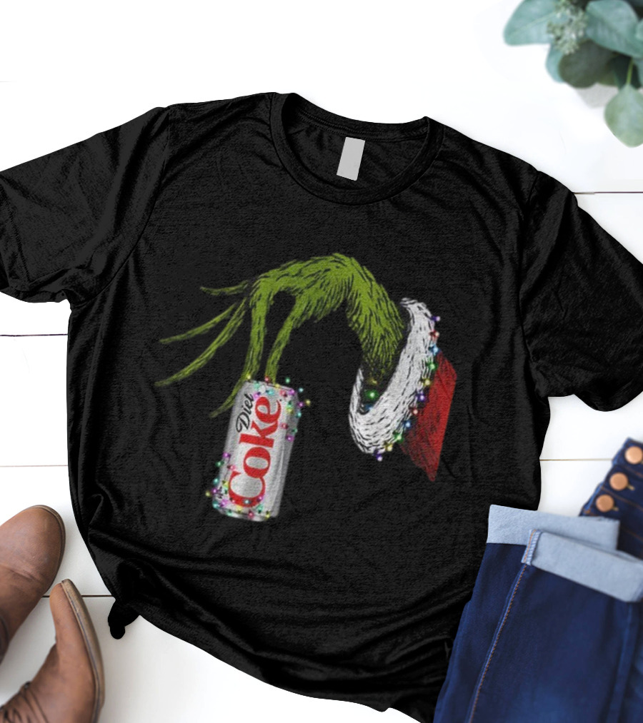 Grinch Hand Holding Diet Coke Can Wrapped In Christmas Lights Merry Christmas T-Shirt
