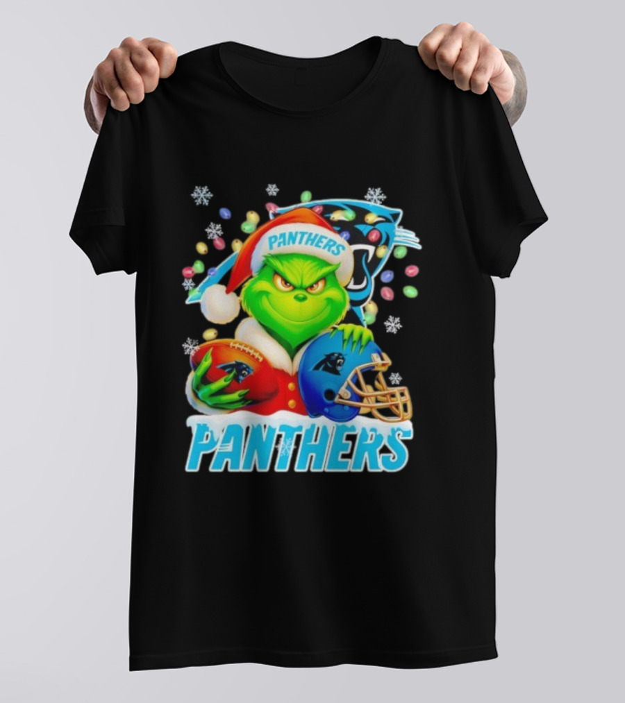 Grinch Santa Hat Holding Carolina Panthers Football And Helmet Merry Christmas T-Shirt