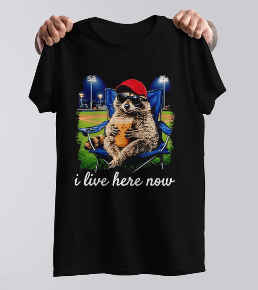 Raccoon I Live Here Now With Sunglasses And Drink At Baseball Field T-Shirt