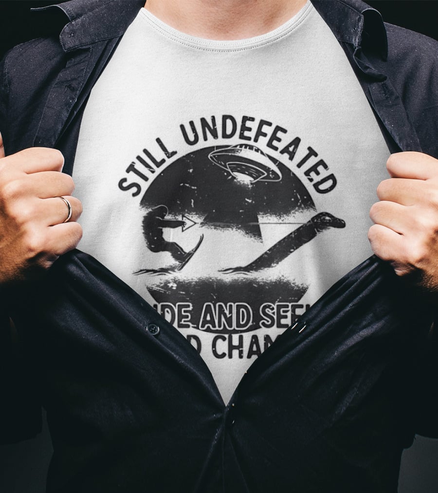 Still Undefeated Hide And Seek World Champion Bigfoot Riding Loch Ness Monster T-Shirt
