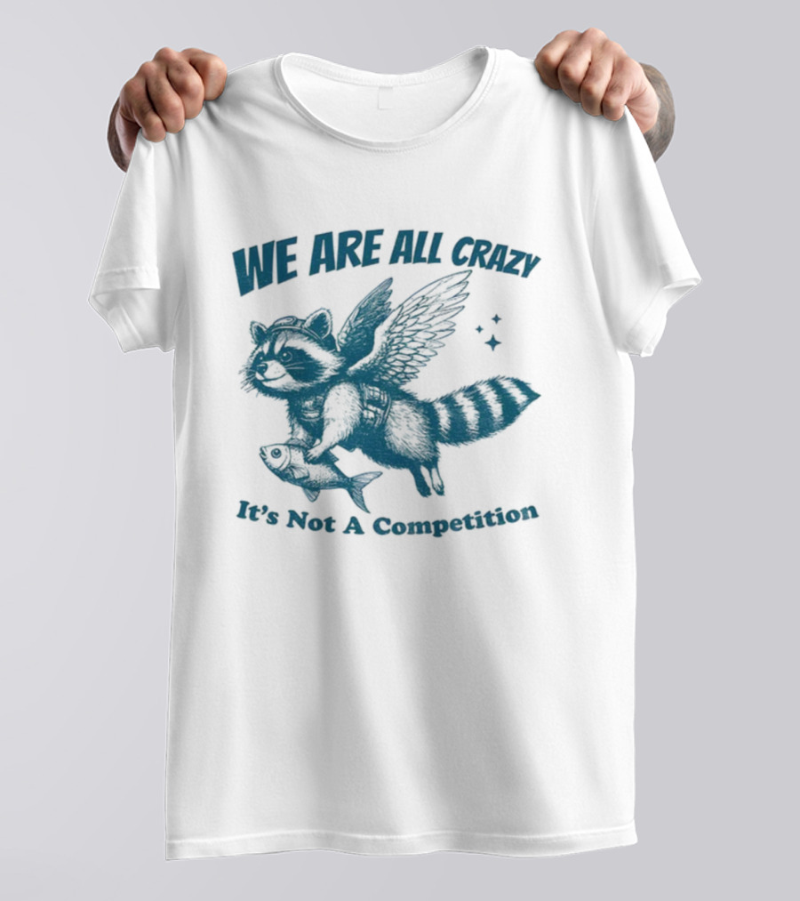 Raccoon With Wings Holding Fish We Are All Crazy It's Not A Competition T-Shirt