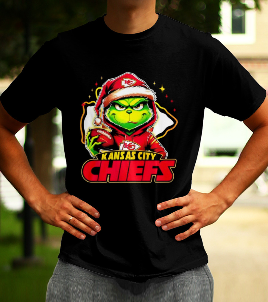 Grinch In Santa Hat Holding Football Kansas City Chiefs T-Shirt