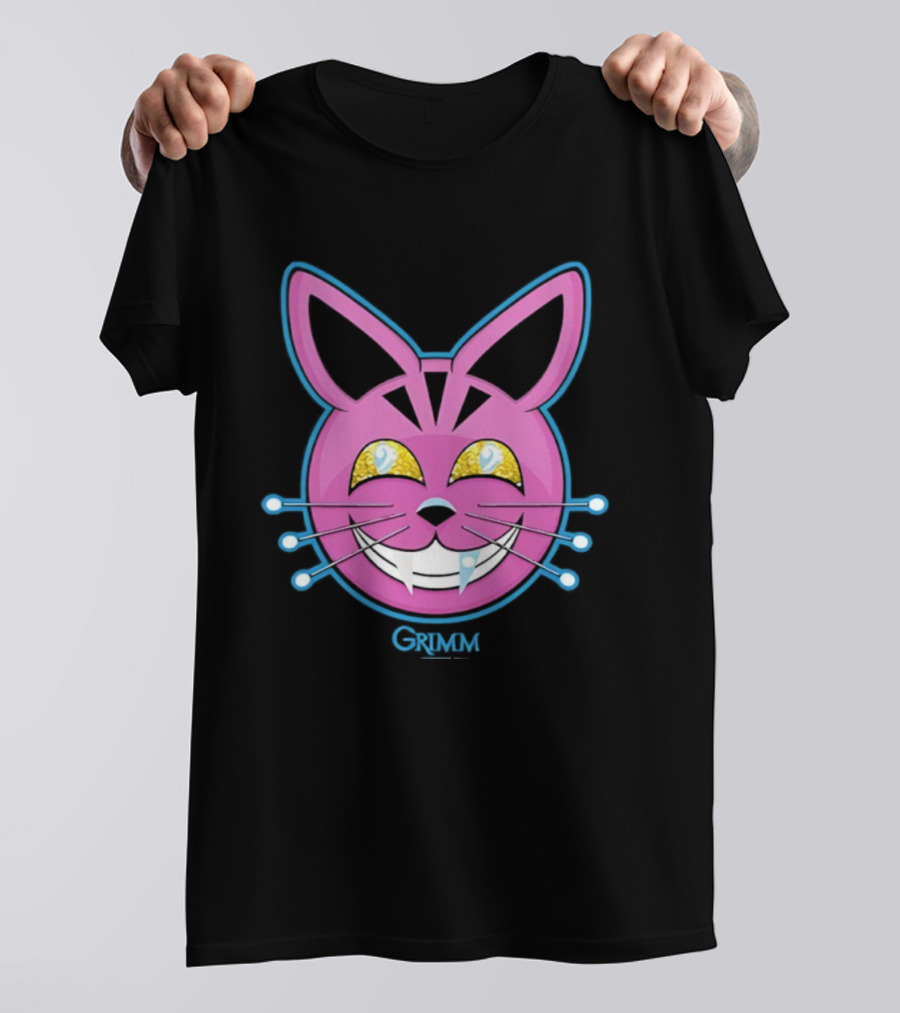 Grimm Retchid Kat Pink Cartoon Face With Yellow Eyes And Blue Whiskers T-Shirt