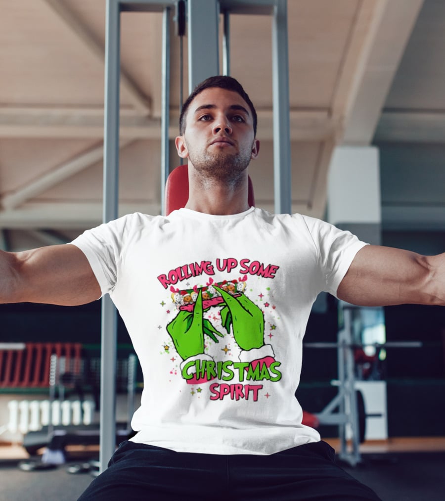 Grinch Rolling Up Some Christmas Spirit With Green Hands And Glitter Stars T-Shirt