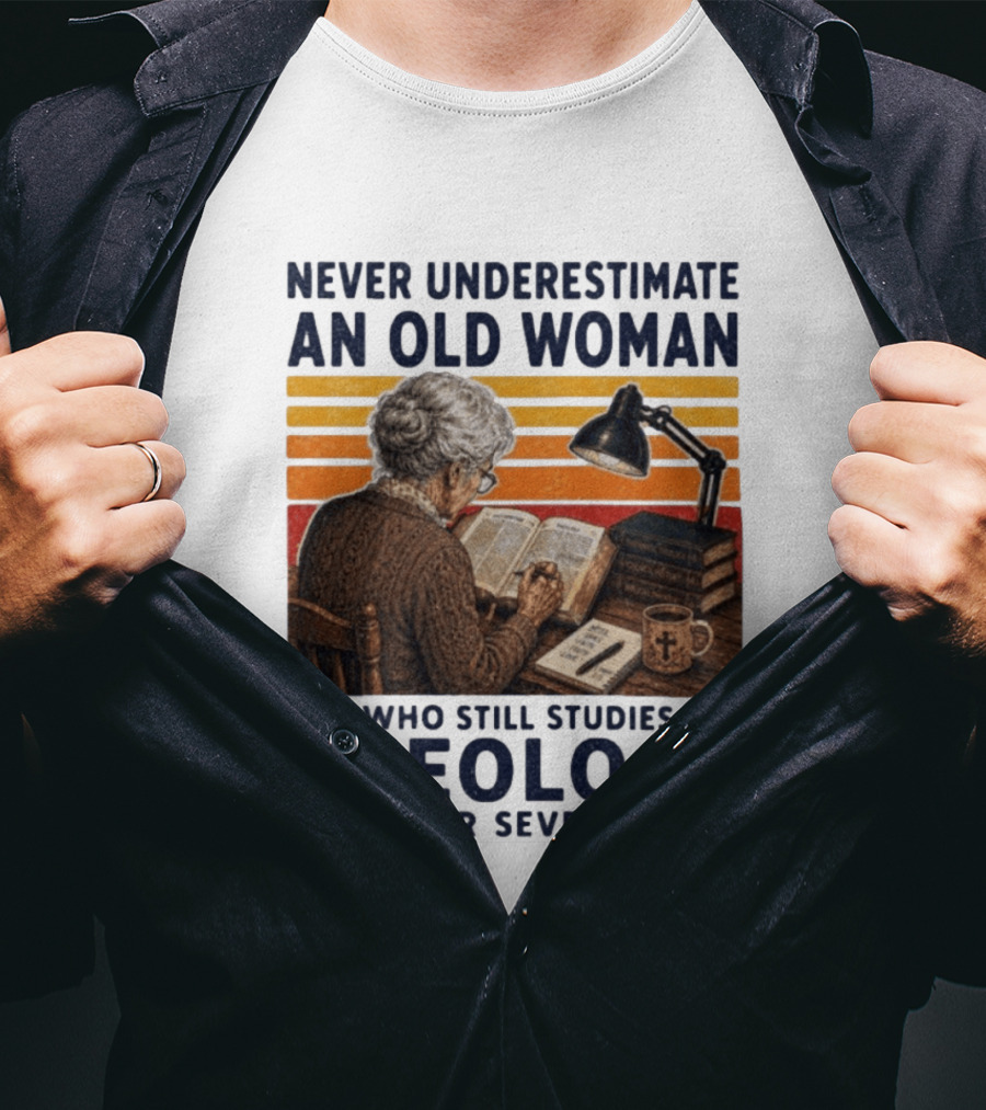 Never Underestimate An Old Woman Who Studies Theology In Her Seventies With Books And Lamp T-Shirt