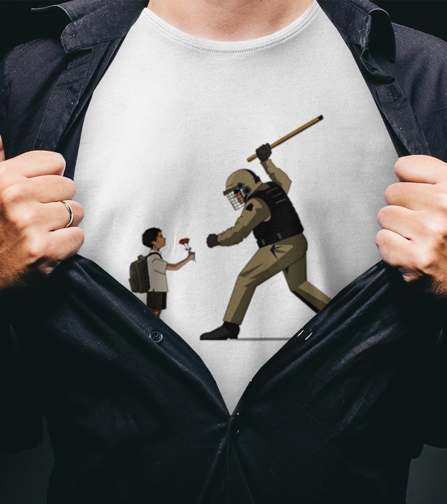 Bloom Under Fire: Child Offering Flower To Armed Officer T-Shirt
