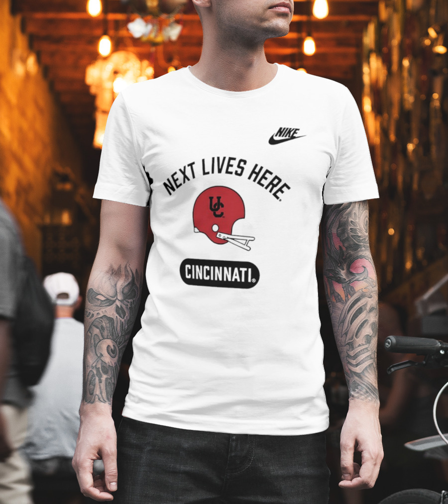 Next Lives Here Cincinnati UC Football Helmet Nike T-Shirt