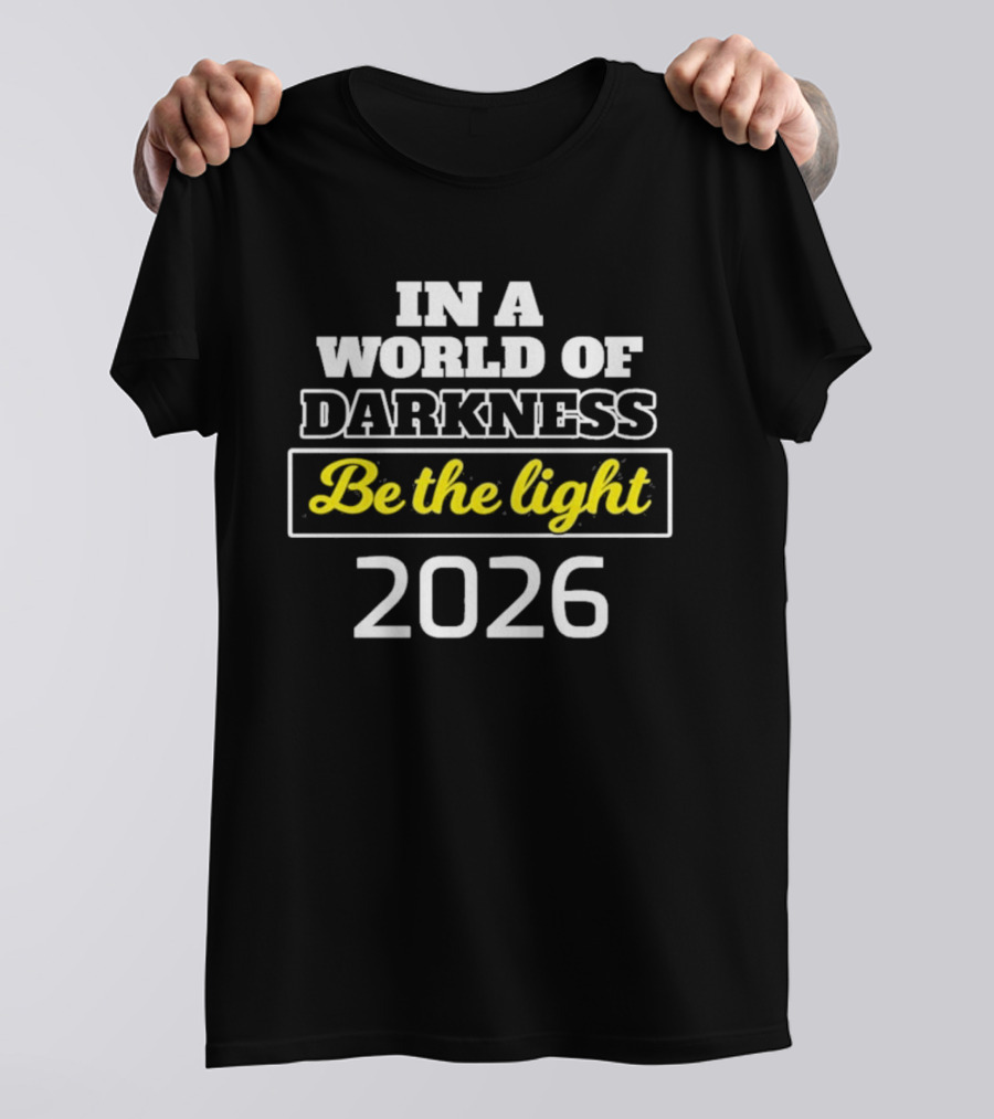 In A World Of Darkness 2026 Be The Light T-Shirt