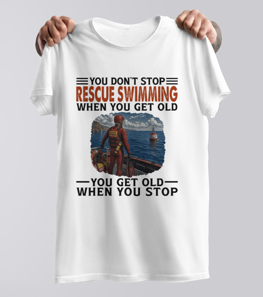 You Don't Stop Rescue Swimming When You Get Old You Get Old When You Stop Rescue Swimmer Standing On Boat Near Lighthouse T-Shirt