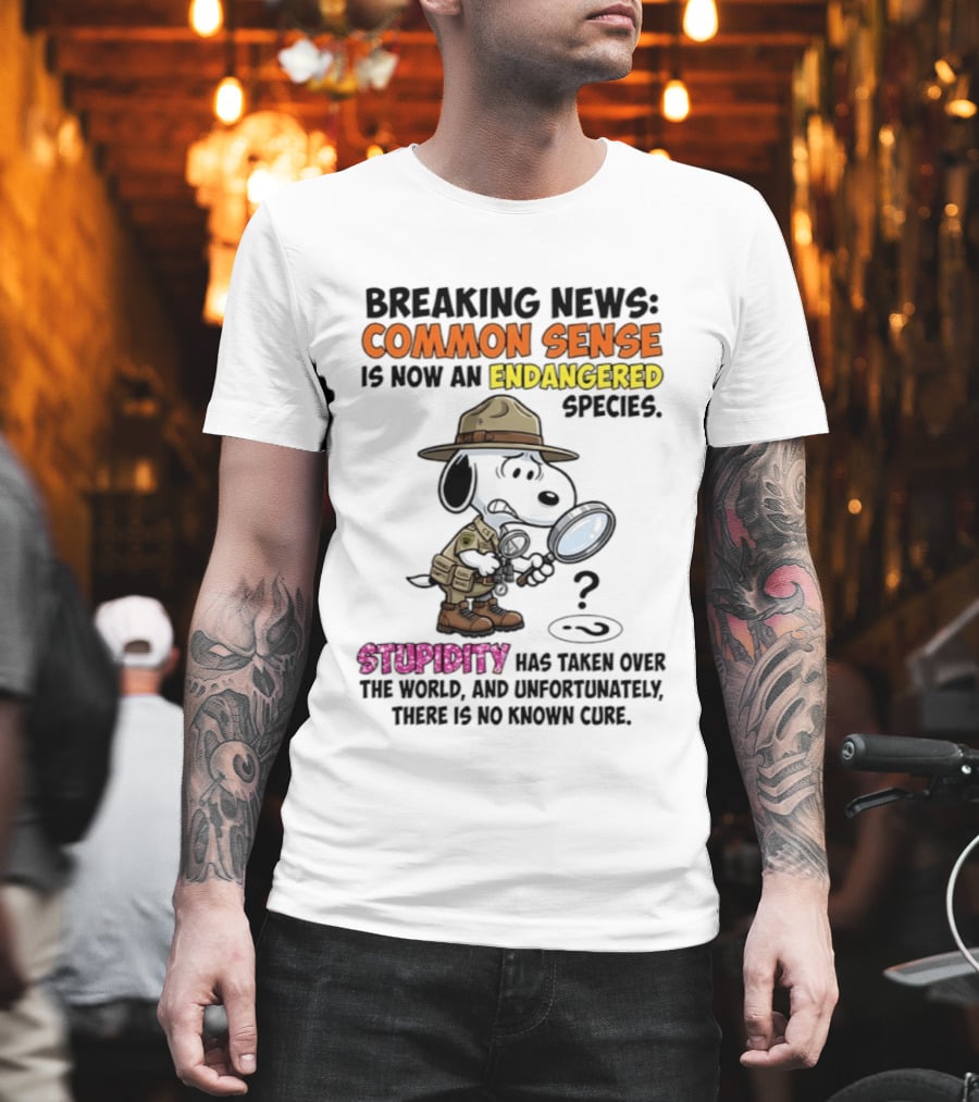 Breaking News Common Sense Endangered Species Stupidity Taken Over Snoopy T-Shirt