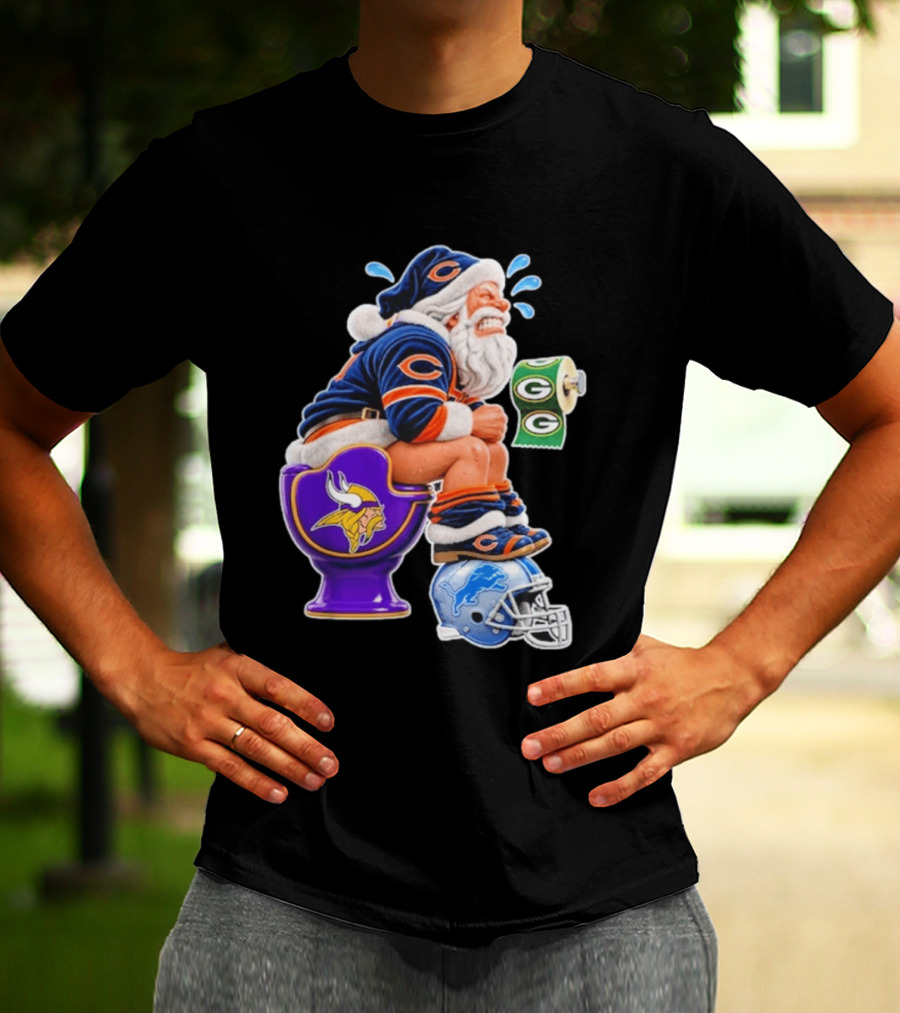 Santa Claus On Toilet Minnesota Vikings Detroit Lions Green Bay Packers Chicago Bears Funny Christmas 2026 Football T-Shirt