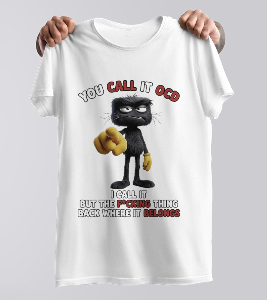 You Call It OCD I Call It Putting The F*cking Thing Back Where It Belongs Grumpy Black Furry Character Pointing T-Shirt