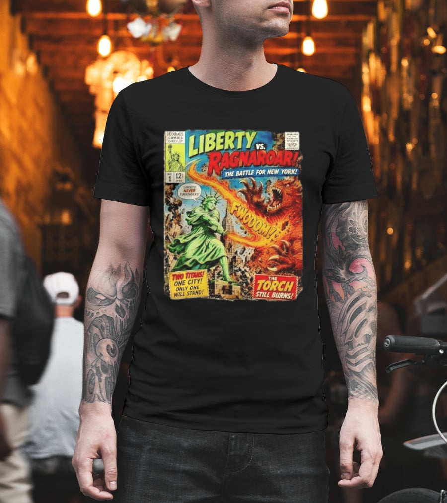 Heckhaus Comics Group Liberty Vs Ragnaroar The Battle For New York Fwooom Two Titans One City Only One Will Stand The Torch Still Burns T-Shirt