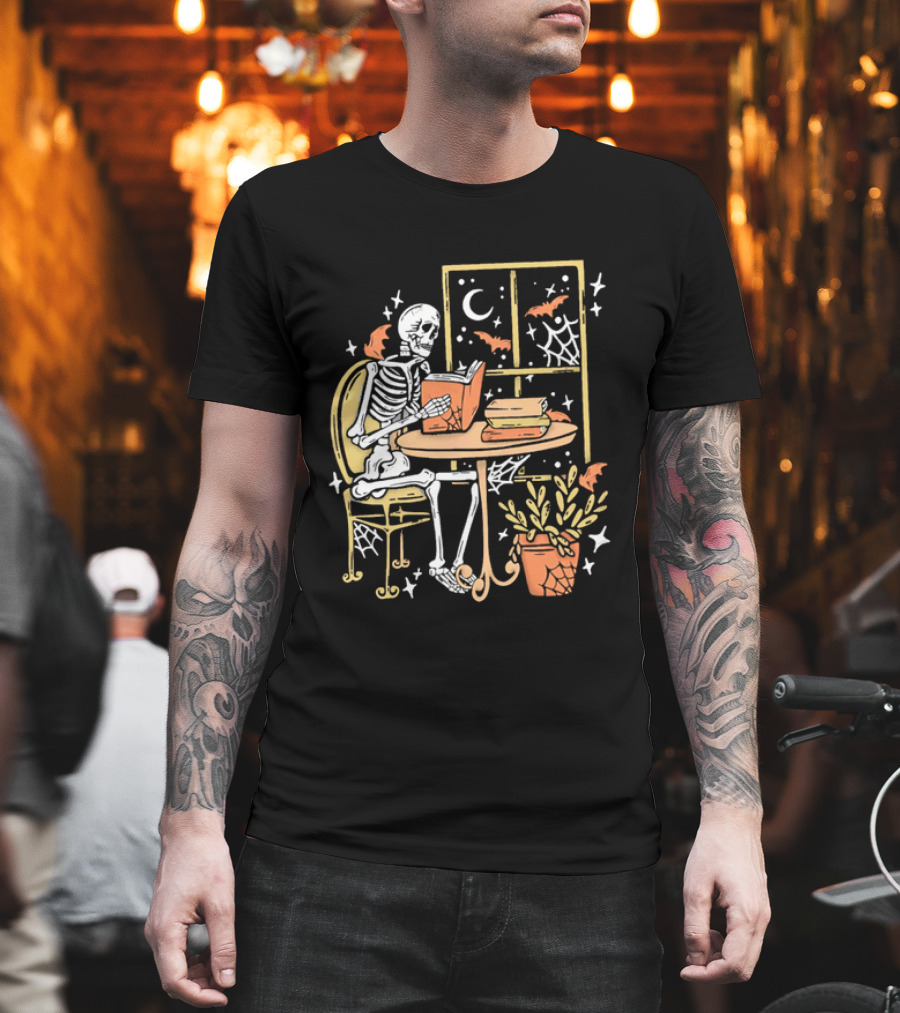 Cartoon Skeleton Reading Under Crescent Moon With Bats Orange Book Table Window T-Shirt