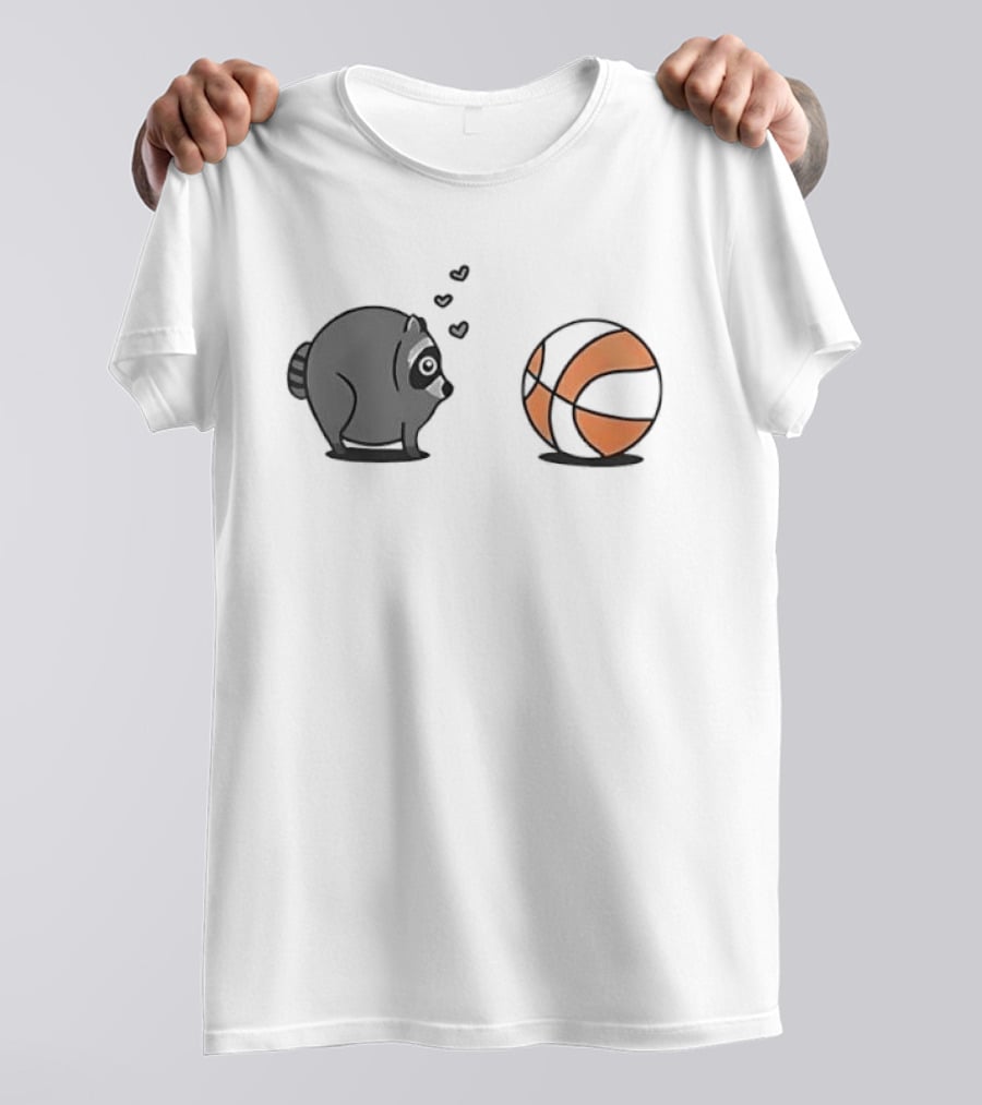 Chubby Cartoon Raccoon Admiring Basketball With Pink Hearts T-Shirt