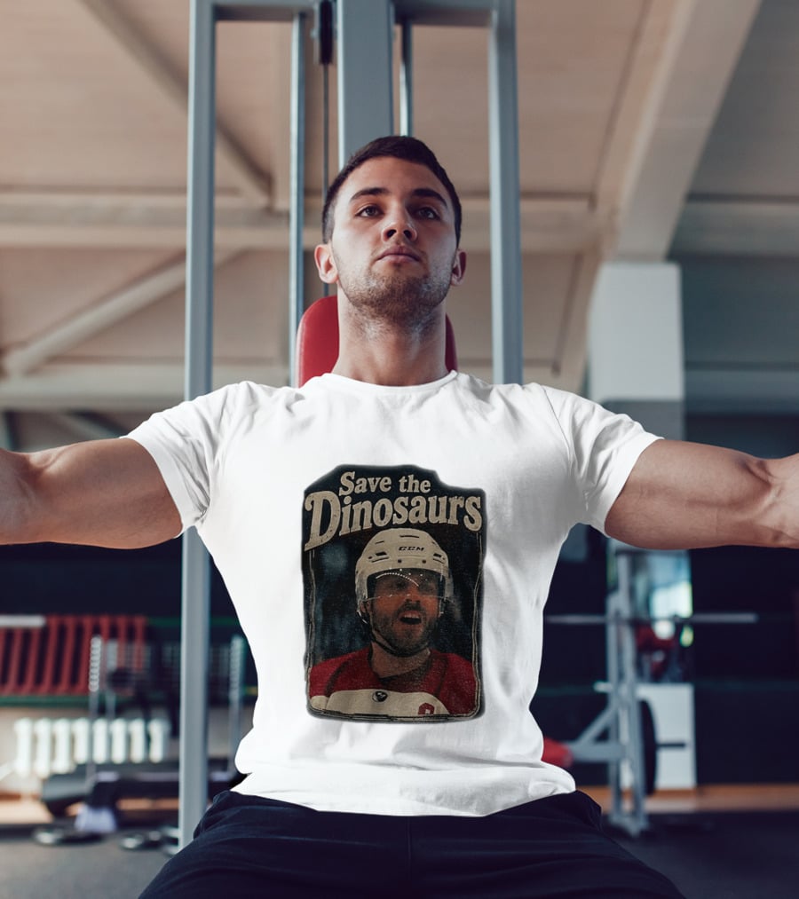 Connor Storrie Wearing Scott Hunter Save The Dinosaurs CCM Hockey T-Shirt