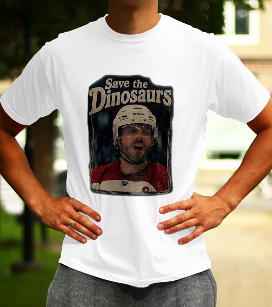 Connor Storrie Wearing Scott Hunter Save The Dinosaurs CCM Hockey T-Shirt