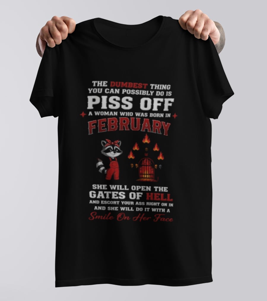 The Dumbest Thing You Can Possibly Do Is Piss Off A Woman Born In February Raccoon Gates Of Hell With A Smile On Her Face T-Shirt