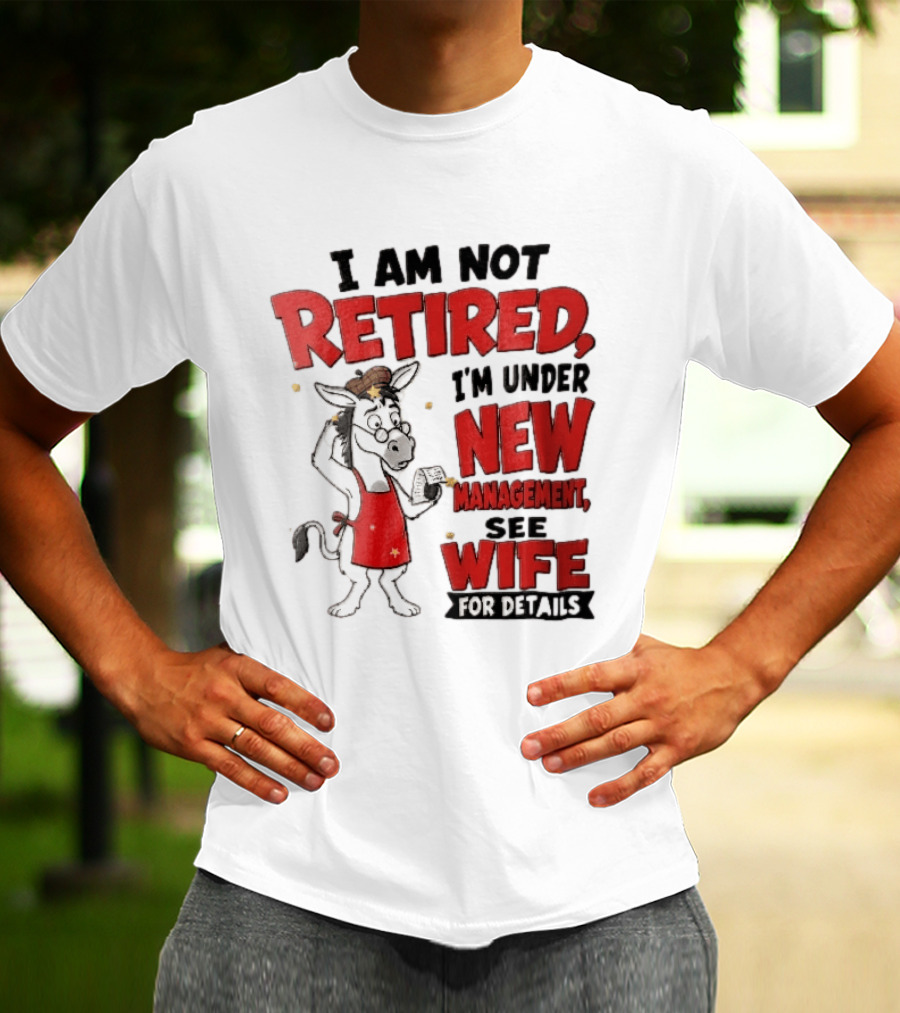 I Am Not Retired I'm Under New Management See Wife For Details Cartoon Donkey Red Apron T-Shirt