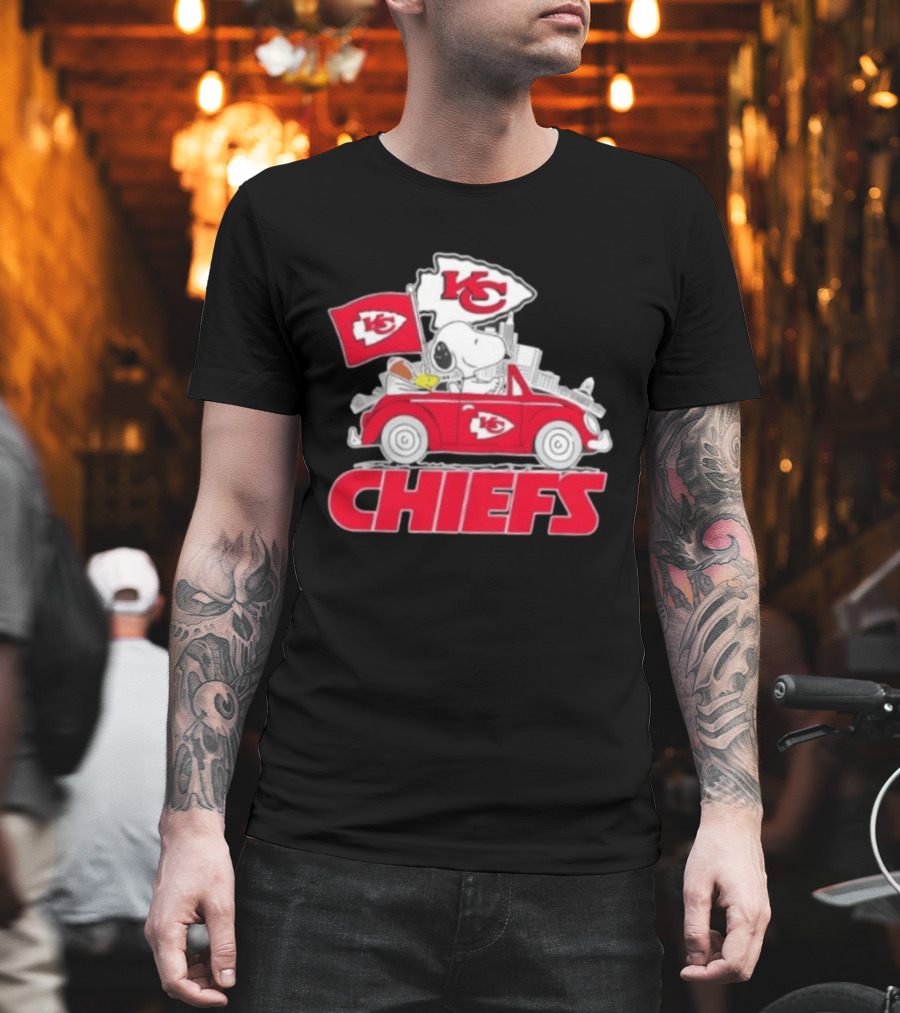 Snoopy Driving Kansas City Chiefs Car With Skyline And Flag T-Shirt