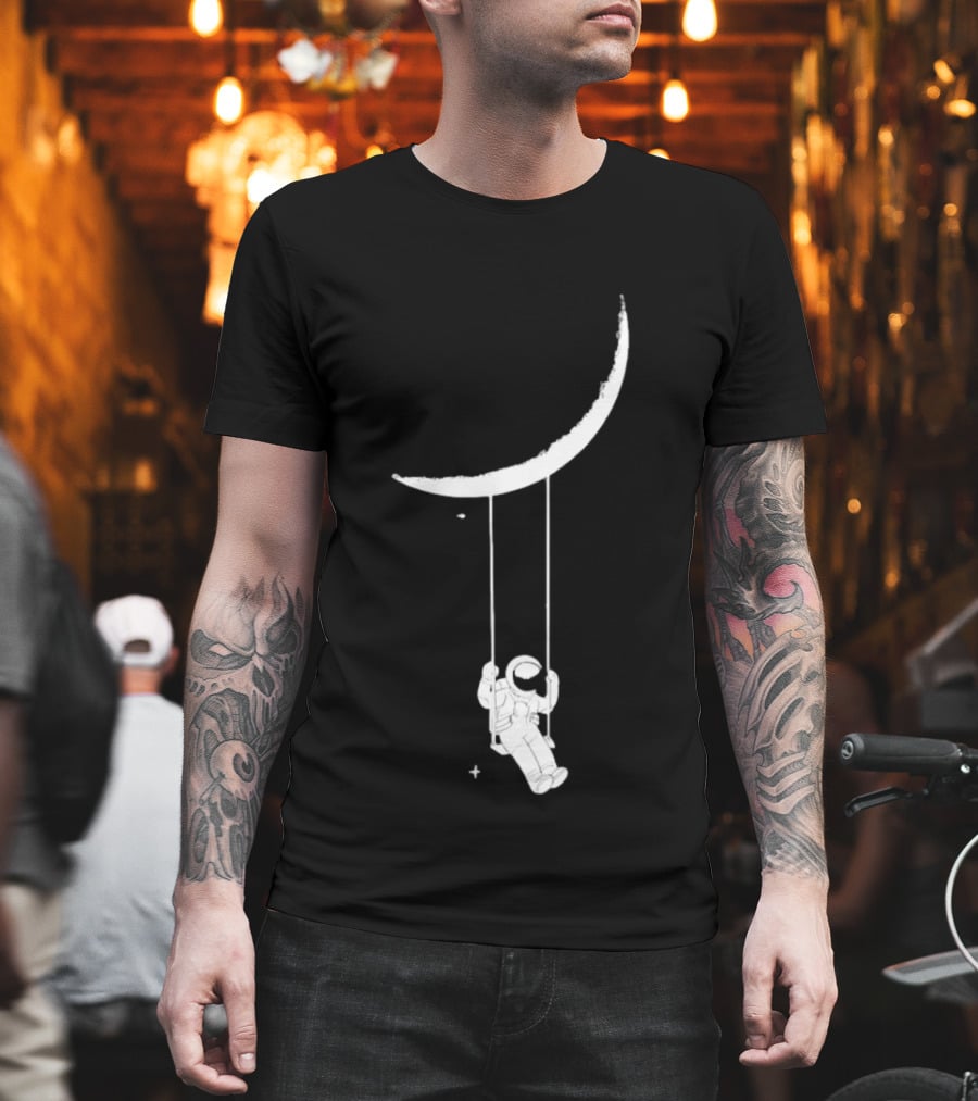 Astronaut Swinging On Crescent Moon Space Scene T-Shirt
