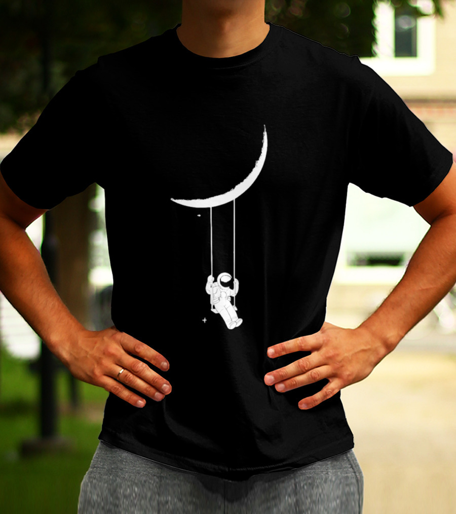 Astronaut Swinging On Crescent Moon Space Scene T-Shirt