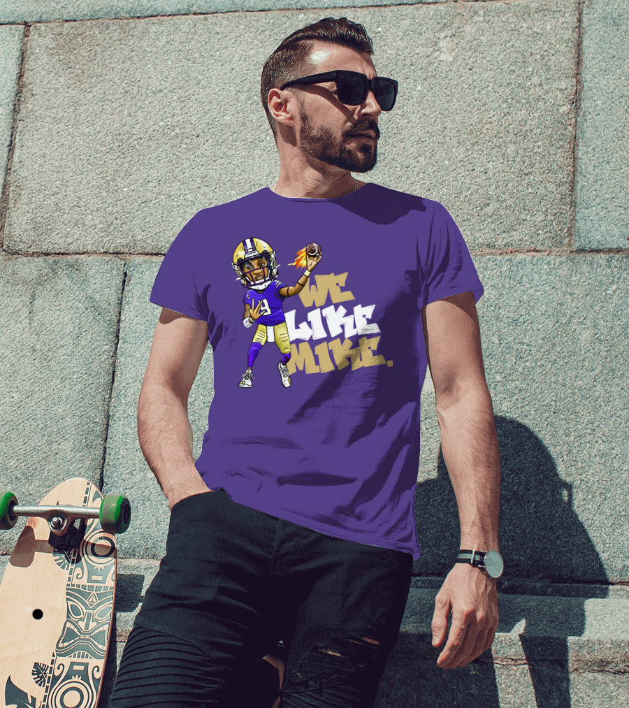 We Like Mike Football Character In Purple And Gold Gear Holding Flaming Ball T-Shirt