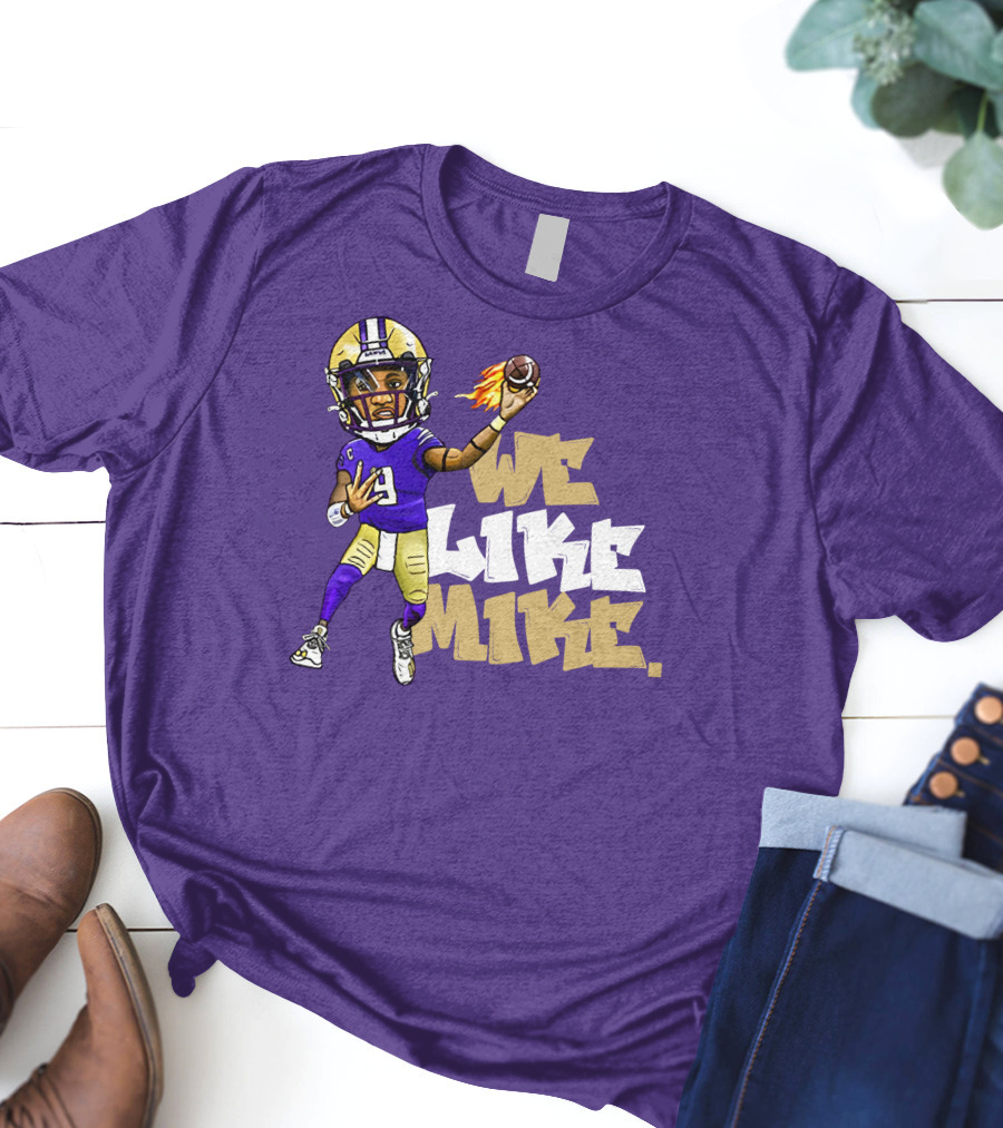 We Like Mike Football Character In Purple And Gold Gear Holding Flaming Ball T-Shirt