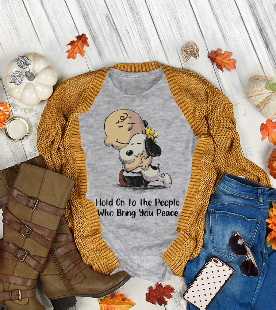 Hold On To The People Who Bring You Peace Charlie Brown Snoopy Woodstock Hug T-Shirt