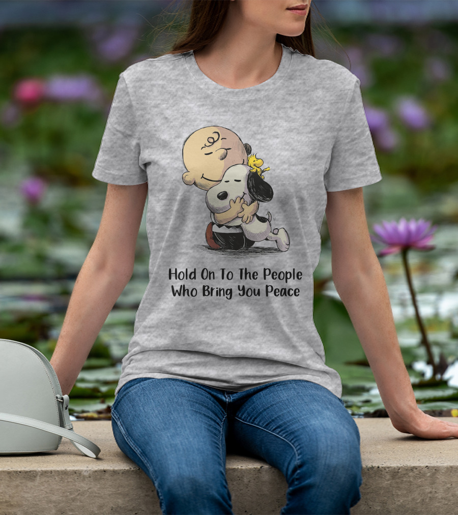 Hold On To The People Who Bring You Peace Charlie Brown Snoopy Woodstock Hug T-Shirt