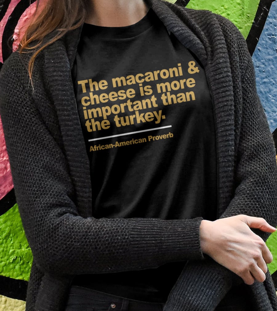 Gildan Fleece Crewneck The Macaroni And Cheese Is More Important Than The Turkey African-American Proverb Style G18000 T-Shirt