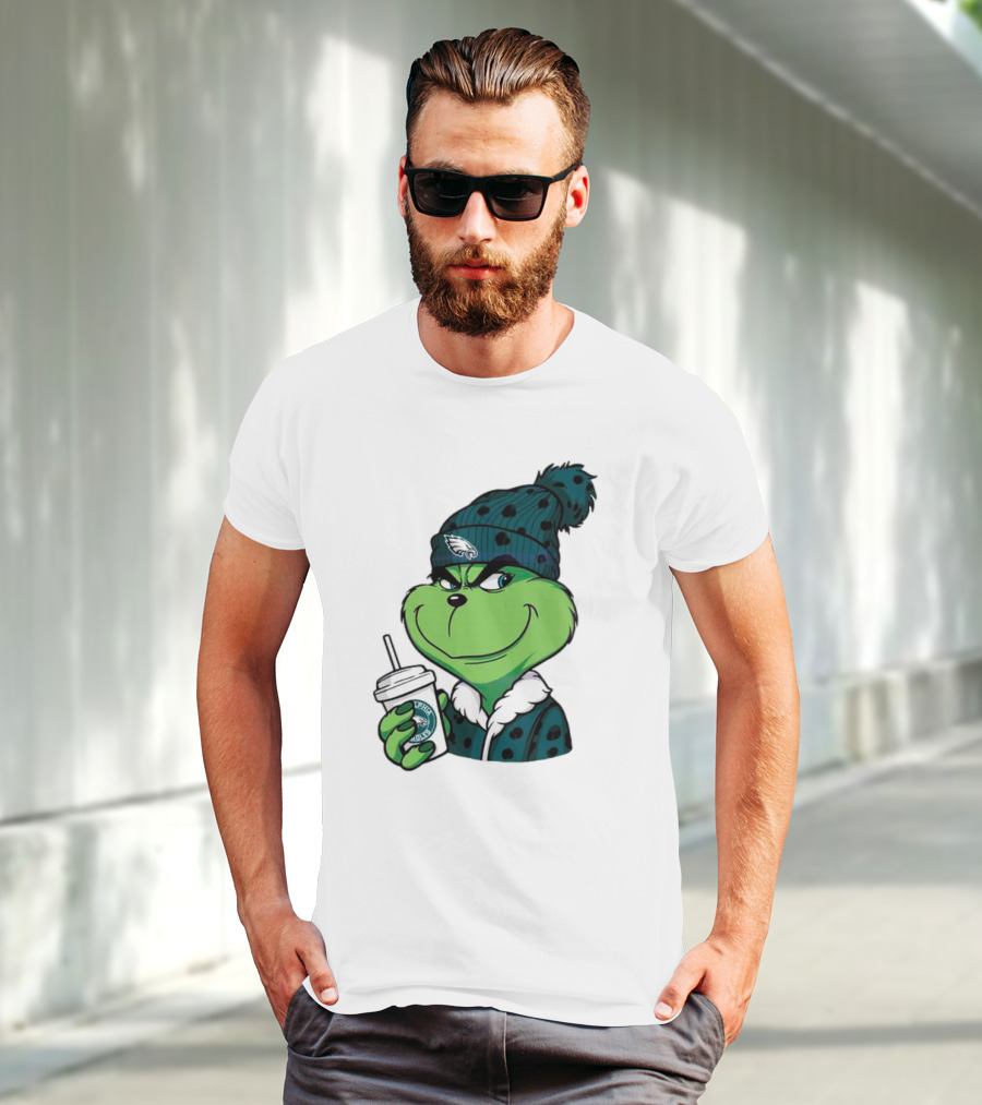 Grinch Holding Cup Wearing Philadelphia Eagles Beanie T-Shirt